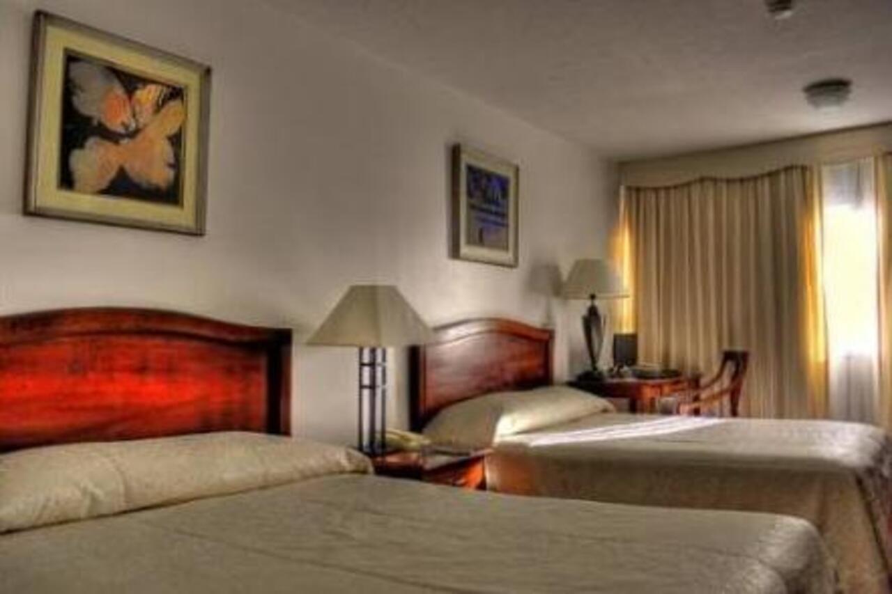 Palladium Business Hotel Montevideo Phòng bức ảnh